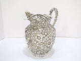 9 in - Sterling Silver Jenkins & Jenkins Antique Floral Repousse Pitcher