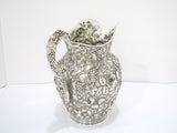 9 in - Sterling Silver Jenkins & Jenkins Antique Floral Repousse Pitcher