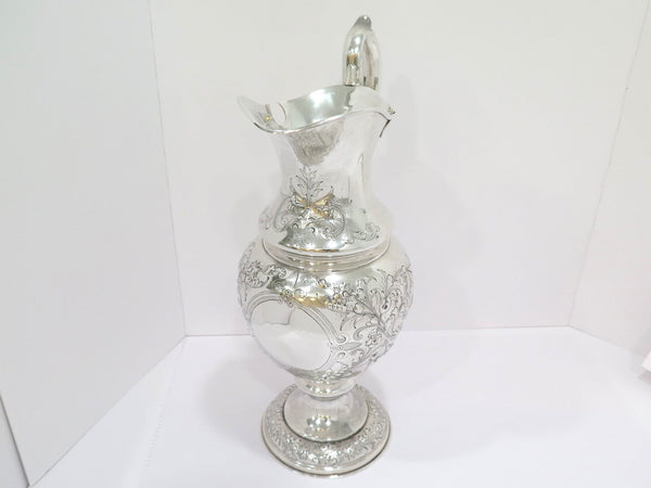 18 3/8 in - Sterling Silver Duhme & Co. Antique Floral Repousse Pitcher