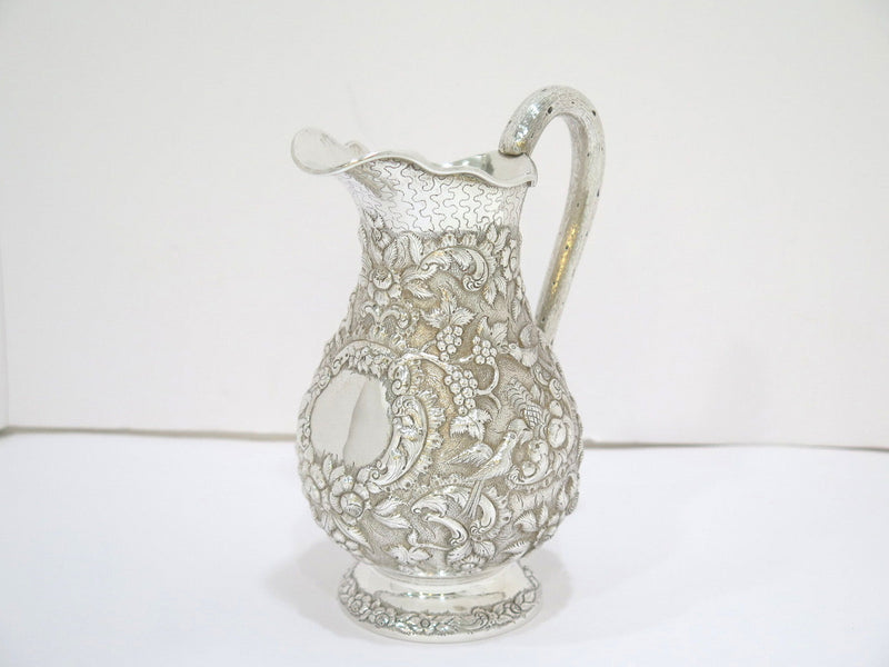 8 in - Coin Silver A. E. Warner Antique Birds Flowers Repousse Small Pitcher