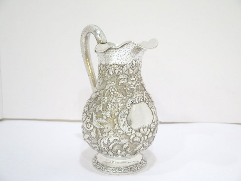 8 in - Coin Silver A. E. Warner Antique Birds Flowers Repousse Small Pitcher